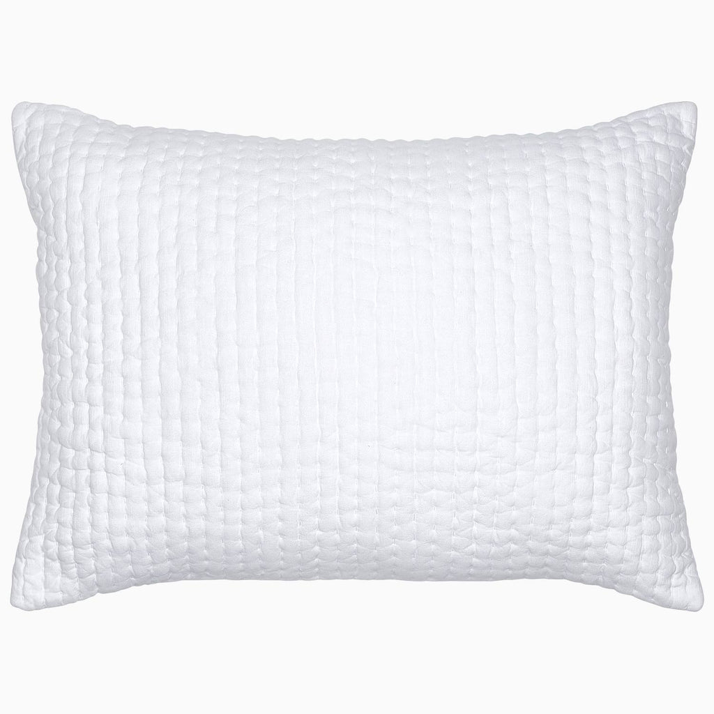 A Vivada White Woven Quilt pillow with hand stitching on a white background by John Robshaw.