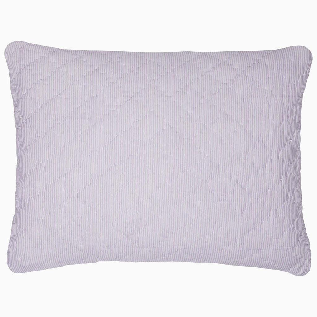 A John Robshaw Nandi Lavender Quilt featuring block printing on a white cotton background.