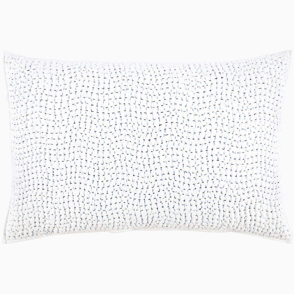 A John Robshaw Organic Hand Stitched Light Indigo Quilt with blue dots.