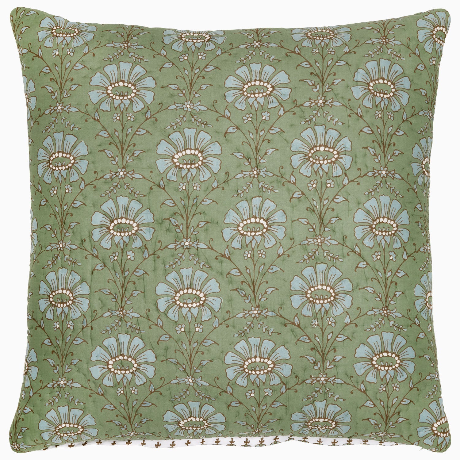 "The Jeeva Sage Quilt by John Robshaw is a square throw pillow with a light green background showcasing a spring meadow design of white and light blue flowers with brown stems and leaves, all hand quilted from soft cotton."