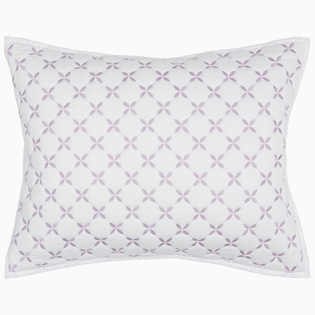 "A Layla Lavender Quilt pillow with a cross design, made from cotton voile, by John Robshaw."