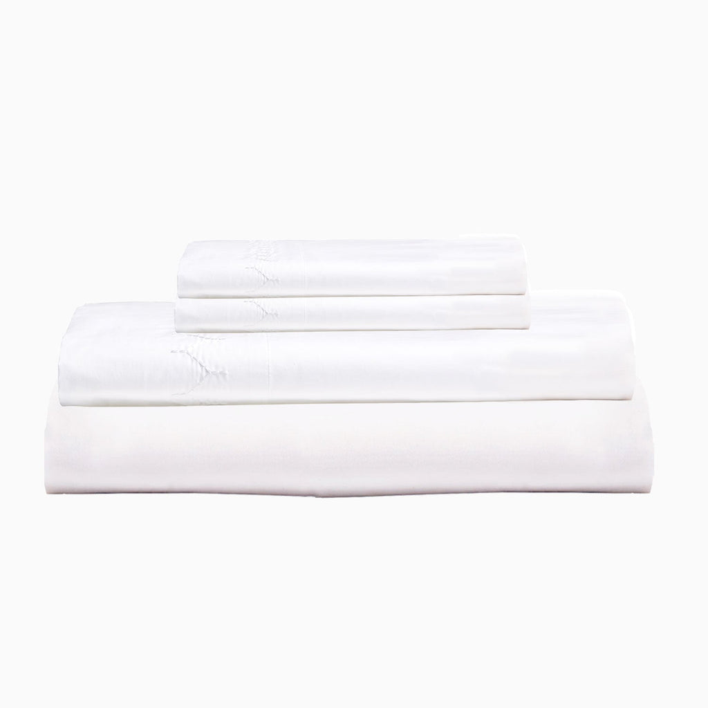 "Three Stitched White Organic Sheets stacked on top of each other made with organic cotton, John Robshaw."
